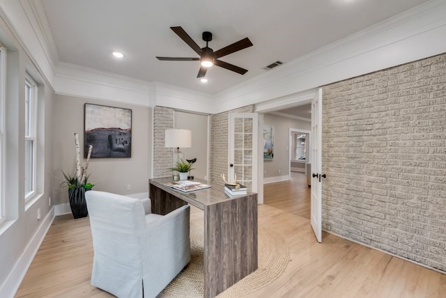 5836 Marquita Ave, Dallas, TX 75206 - home office with ceiling fan, french doors, crown molding, light wood-type flooring, and brick wall