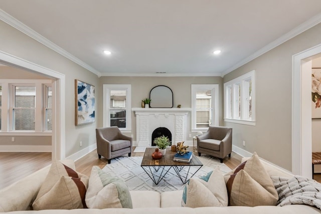 5836 Marquita Ave, Dallas, TX 75206 - living room featuring wood finished floors, crown molding, a fireplace, recessed lighting, and baseboards
