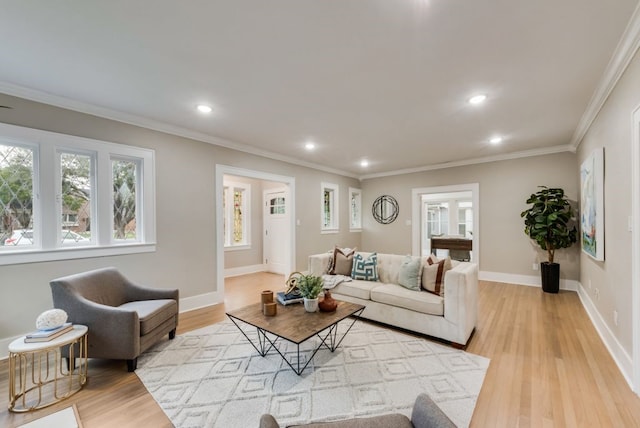 5836 Marquita Ave, Dallas, TX 75206 - living area featuring recessed lighting, light wood-style flooring, crown molding, and baseboards
