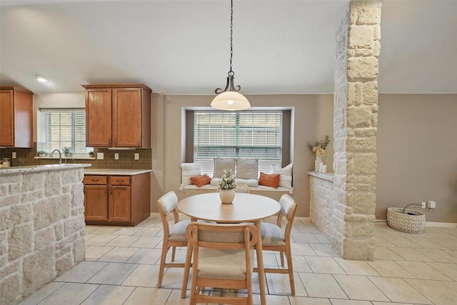 12315 Red Hawk Dr, Frisco, TX 75033 - dining area with light tile patterned floors and baseboards
