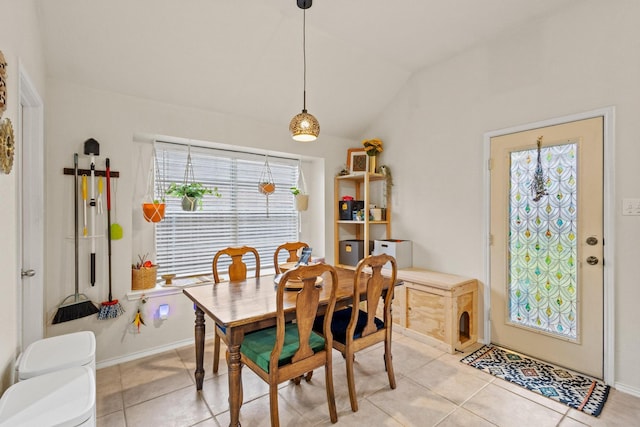 3705 Applewood Rd, Melissa, TX 75454 - dining room featuring lofted ceiling, light tile patterned floors, and baseboards