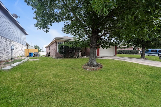 7922 Jubilant Dr, Dallas, TX 75237 - view of front of home with concrete driveway, a front yard, a garage, and brick siding