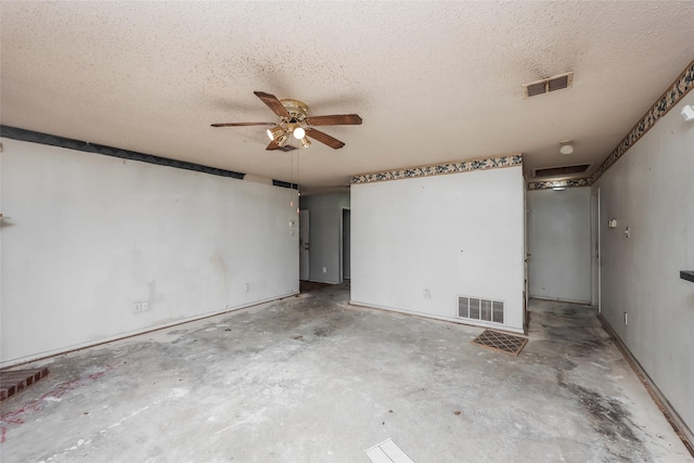 7922 Jubilant Dr, Dallas, TX 75237 - unfurnished room with a ceiling fan, a textured ceiling, and unfinished concrete floors