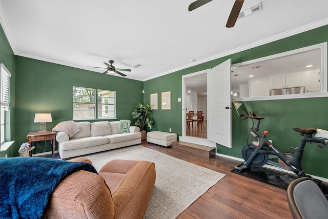 211 N 40th St, Waco, TX 76710 - living area with ceiling fan, wood finished floors, ornamental molding, and baseboards