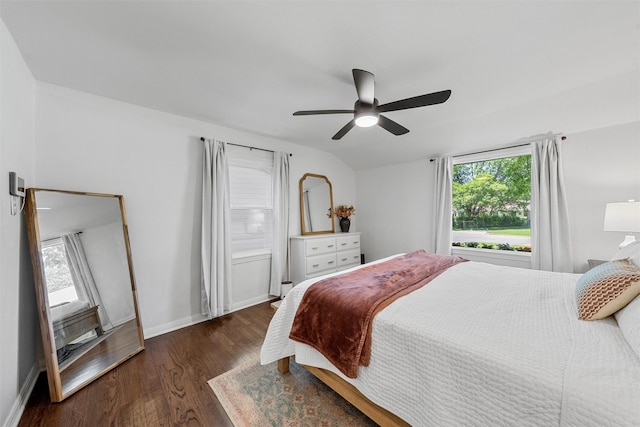 211 N 40th St, Waco, TX 76710 - bedroom with dark wood-style flooring, baseboards, and a ceiling fan
