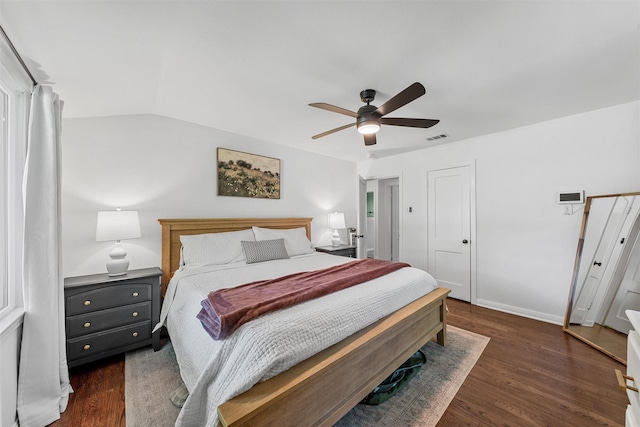 211 N 40th St, Waco, TX 76710 - bedroom with wood finished floors, a ceiling fan, and baseboards
