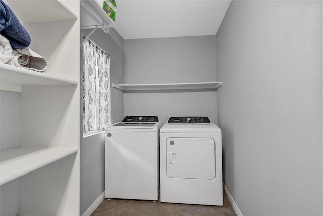 211 N 40th St, Waco, TX 76710 - laundry room featuring separate washer and dryer, baseboards, and tile patterned floors