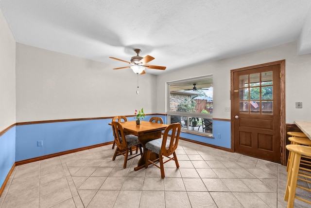 204 Glenwick Pl, Allen, TX 75013 - dining room featuring a ceiling fan, baseboards, and a textured ceiling