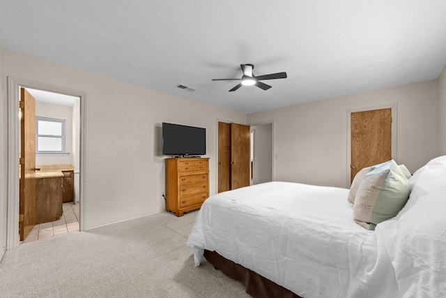 204 Glenwick Pl, Allen, TX 75013 - bedroom featuring light colored carpet, connected bathroom, ceiling fan, and baseboards