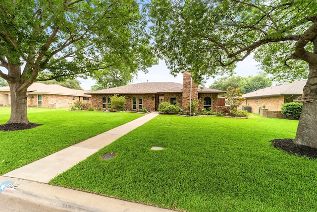 204 Glenwick Pl, Allen, TX 75013 - single story home featuring a front lawn, a chimney, and brick siding