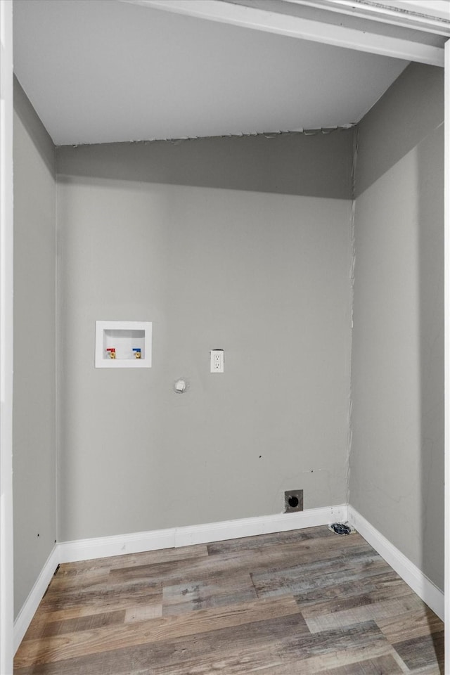 406 N Ruddell St, Denton, TX 76209 - washroom with electric dryer hookup, washer hookup, wood finished floors, and baseboards