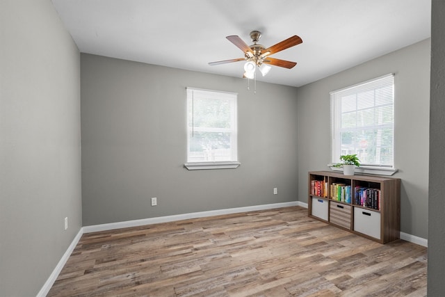 406 N Ruddell St, Denton, TX 76209 - unfurnished room featuring ceiling fan, wood finished floors, and baseboards