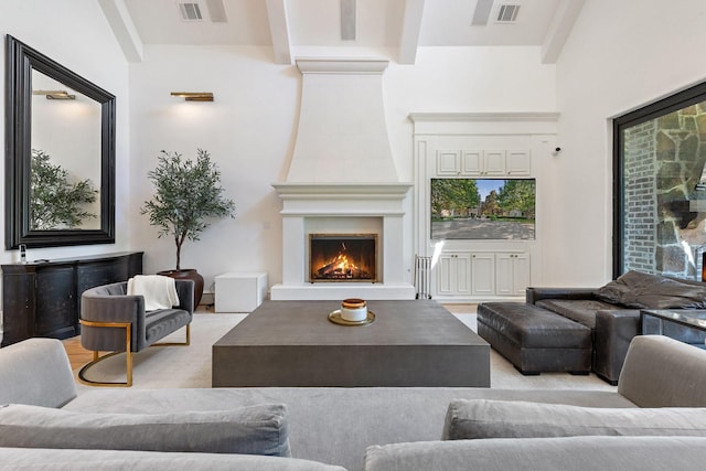 2 Terrabella Ln, Heath, TX 75032 - carpeted living area with a large fireplace and beamed ceiling