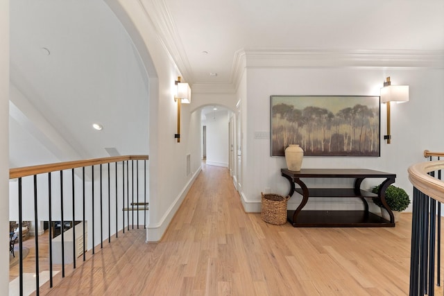 2 Terrabella Ln, Heath, TX 75032 - corridor featuring arched walkways, crown molding, wood finished floors, and baseboards