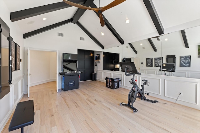 2 Terrabella Ln, Heath, TX 75032 - exercise area featuring a decorative wall, high vaulted ceiling, light wood-style flooring, recessed lighting, and wainscoting