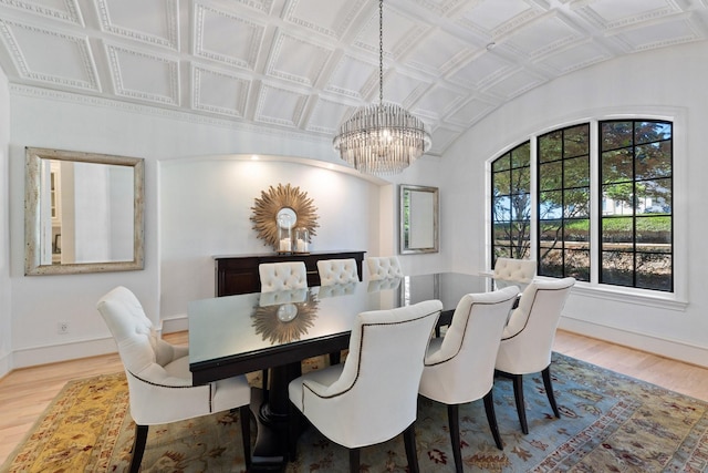 2 Terrabella Ln, Heath, TX 75032 - dining room with a chandelier, wood finished floors, baseboards, and lofted ceiling