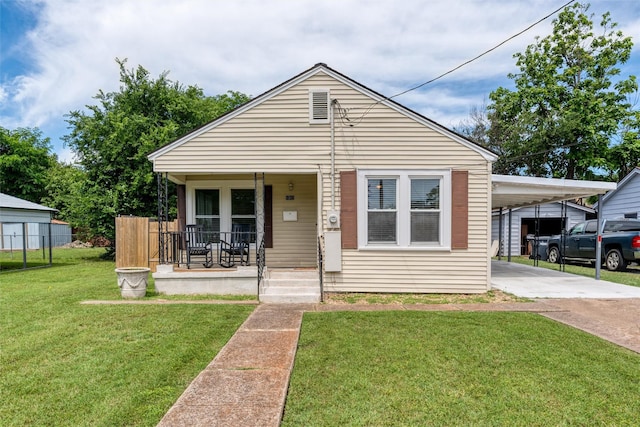 1311 Oak St, Mckinney, TX 75069 - view of front of home with a porch, concrete driveway, and a carport