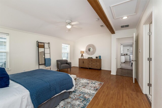 1311 Oak St, Mckinney, TX 75069 - bedroom with wood finished floors, ornamental molding, attic access, recessed lighting, and ceiling fan
