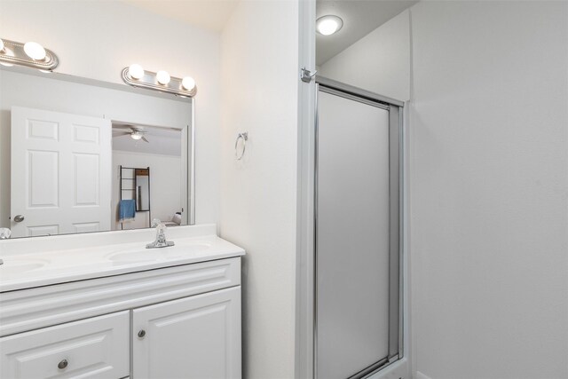 1311 Oak St, Mckinney, TX 75069 - full bath featuring double vanity, a shower stall, and a ceiling fan