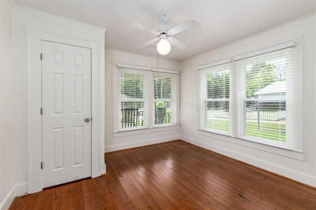 1311 Oak St, Mckinney, TX 75069 - unfurnished room featuring baseboards, wood finished floors, ceiling fan, and crown molding