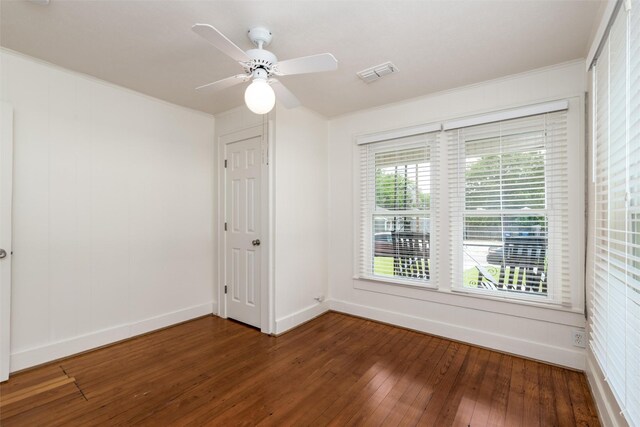 1311 Oak St, Mckinney, TX 75069 - empty room featuring hardwood / wood-style flooring, baseboards, ceiling fan, and crown molding
