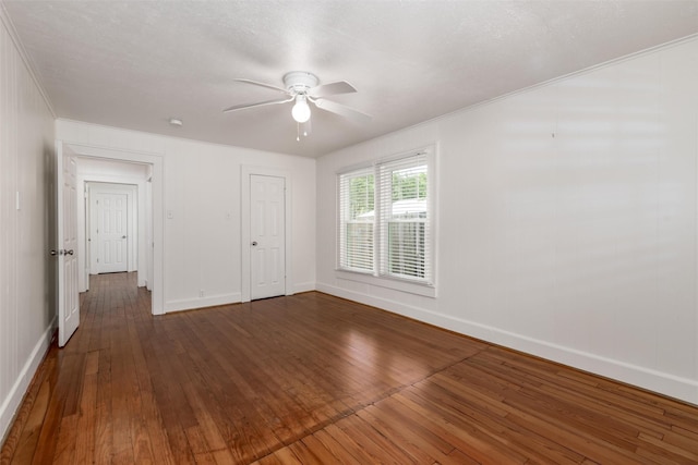 1311 Oak St, Mckinney, TX 75069 - unfurnished bedroom with dark wood-style flooring, baseboards, ornamental molding, and ceiling fan
