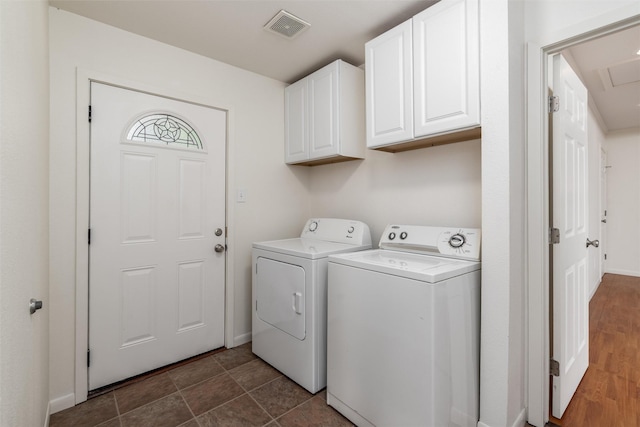 1311 Oak St, Mckinney, TX 75069 - laundry area featuring independent washer and dryer, cabinet space, and baseboards