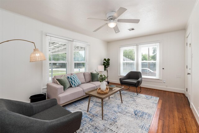 1311 Oak St, Mckinney, TX 75069 - living area featuring baseboards, wood finished floors, and ceiling fan