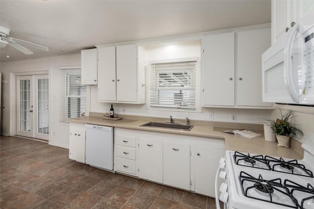 1311 Oak St, Mckinney, TX 75069 - kitchen with white appliances, a sink, a ceiling fan, light countertops, and white cabinets