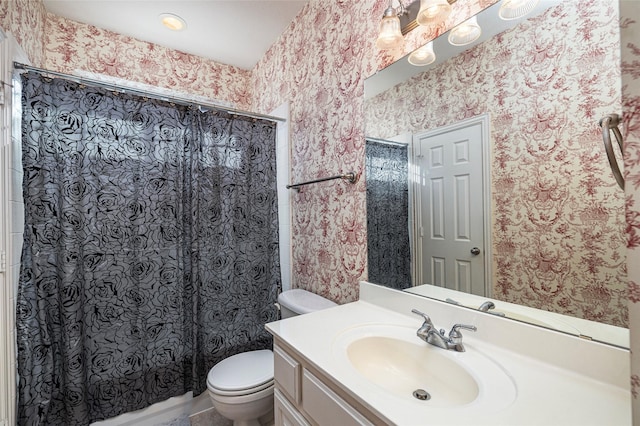 437 Fox Trl, Allen, TX 75002 - bathroom featuring wallpapered walls, toilet, and vanity