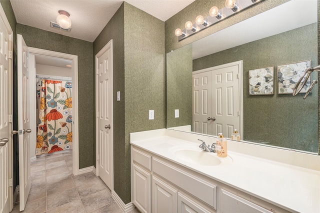 437 Fox Trl, Allen, TX 75002 - bathroom featuring vanity and baseboards