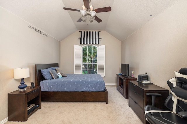 437 Fox Trl, Allen, TX 75002 - bedroom with vaulted ceiling, light colored carpet, ceiling fan, a textured ceiling, and baseboards
