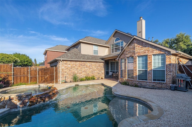 437 Fox Trl, Allen, TX 75002 - view of swimming pool featuring grilling area, a gate, a pool with connected hot tub, and a patio
