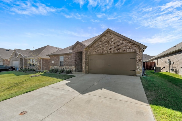 719 Dove Haven Way, Lavon, TX 75166 - view of front of house with brick siding, an attached garage, driveway, cooling unit, and a shingled roof