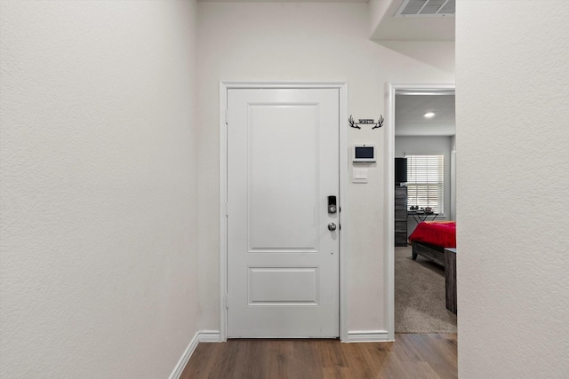 719 Dove Haven Way, Lavon, TX 75166 - hallway with dark wood-type flooring, baseboards, and a textured wall