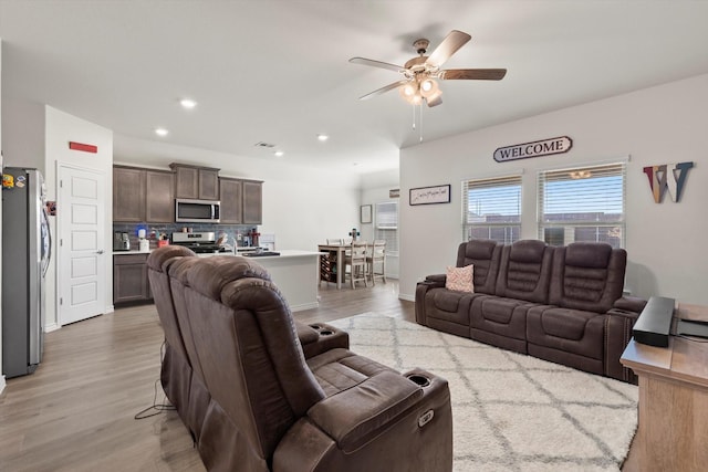 719 Dove Haven Way, Lavon, TX 75166 - living room featuring a ceiling fan, light wood finished floors, and recessed lighting