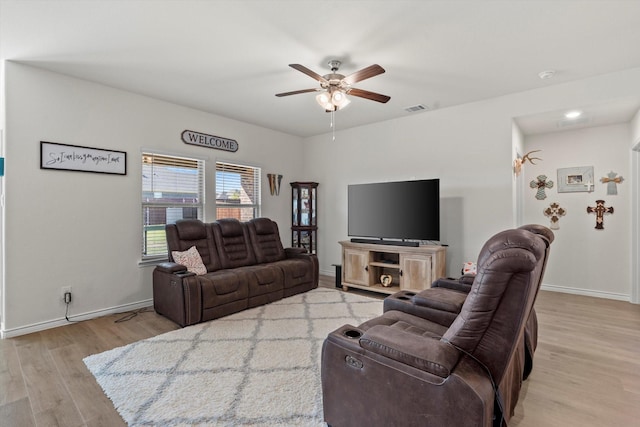 719 Dove Haven Way, Lavon, TX 75166 - living room featuring wood finished floors, ceiling fan, and baseboards