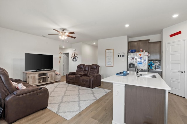 719 Dove Haven Way, Lavon, TX 75166 - living area with ceiling fan, light wood finished floors, and recessed lighting