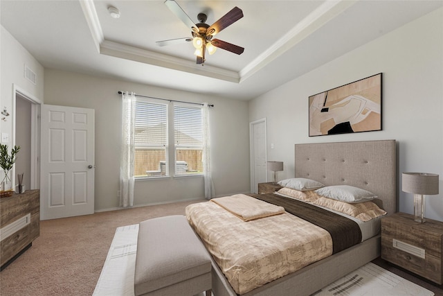 1816 Gayla Creek Dr, Little Elm, TX 75068 - bedroom with a tray ceiling, light carpet, a ceiling fan, ornamental molding, and baseboards