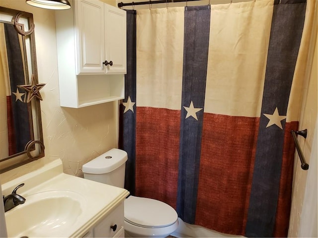 3102 Chestnut Rd, Carrollton, TX 75007 - bathroom featuring toilet, vanity, and a shower with curtain