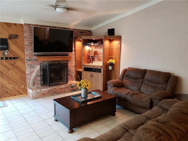 3102 Chestnut Rd, Carrollton, TX 75007 - living room featuring ornamental molding, light tile patterned flooring, a fireplace, and wooden walls
