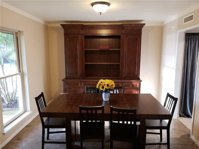 3102 Chestnut Rd, Carrollton, TX 75007 - dining room featuring ornamental molding and baseboards