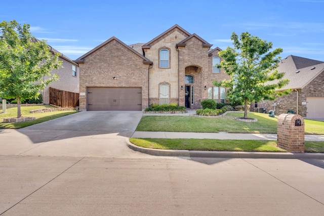 2806 Palmerston Dr, Midlothian, TX 76065 - french provincial home featuring brick siding, concrete driveway, and a garage