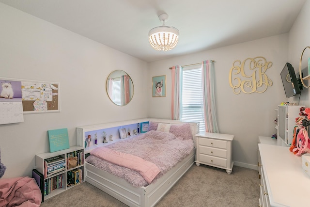 14709 Storyteller Ln, Fort Worth, TX 76052 - bedroom with a chandelier and light colored carpet