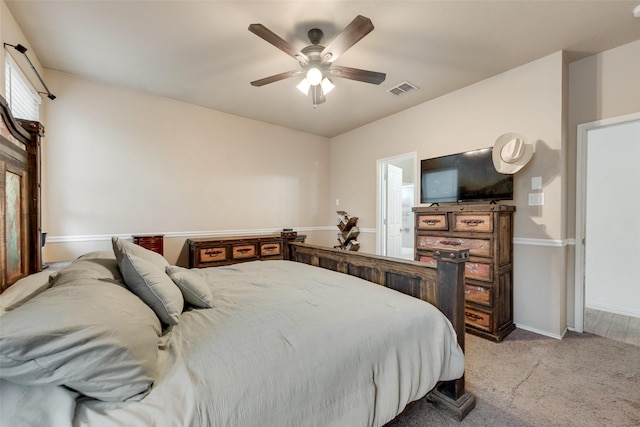 1053 Pullman Dr, Saginaw, TX 76131 - bedroom featuring light carpet, ceiling fan, and baseboards