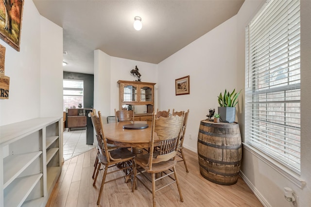 1053 Pullman Dr, Saginaw, TX 76131 - dining space with light wood-style flooring and baseboards