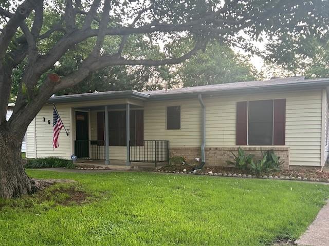 3624 Aurora St, Haltom City, TX 76117 - ranch-style home with a front lawn and brick siding