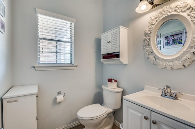 336 Maggie St, Canton, TX 75103 - half bathroom with toilet, vanity, and baseboards