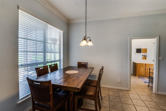 336 Maggie St, Canton, TX 75103 - dining room featuring a chandelier, ornamental molding, baseboards, and light tile patterned floors