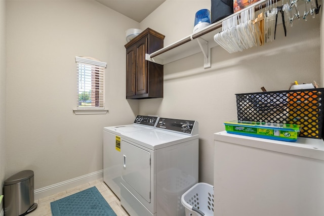 217 Golden Arrow Dr, Weatherford, TX 76087 - laundry room with independent washer and dryer, cabinet space, baseboards, and light tile patterned floors